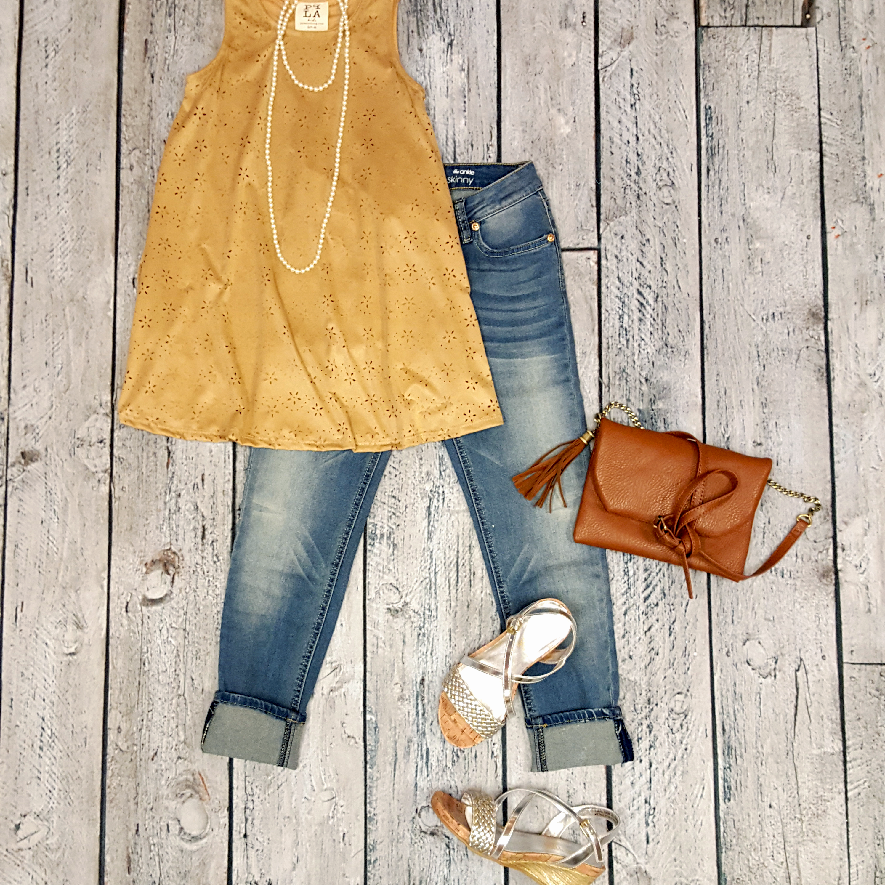 PPLA lasercut seude tunic, 7forAllMankind cropped jeans,Kenneth Cole wedges,tassel purse, and extra-long pearl necklace